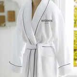 WO|MN embroidered logo 100% cotton waffle weave robe with black piping trim and two pockets - white